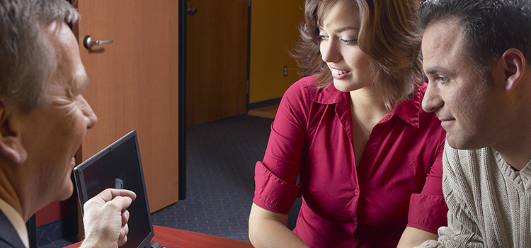 Credit counselor meeting with a couple